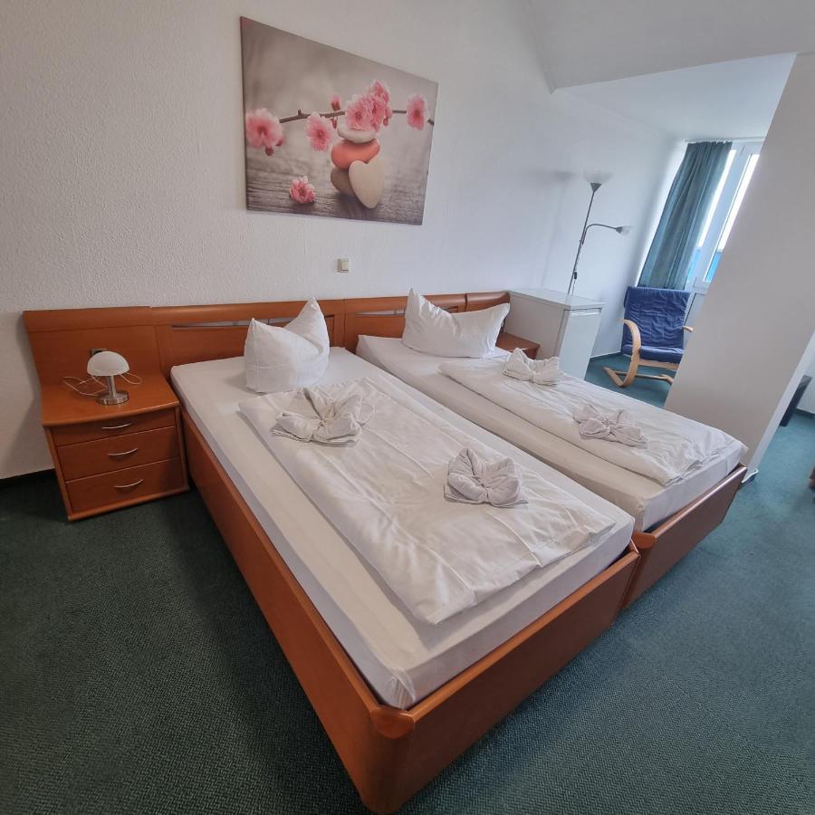 Doppel- oder Zweibettzimmer